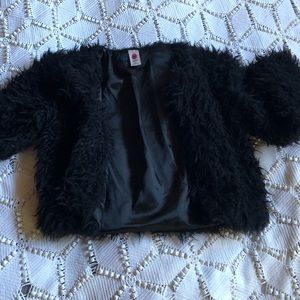 Girls black faux fur shrug size 10/12.